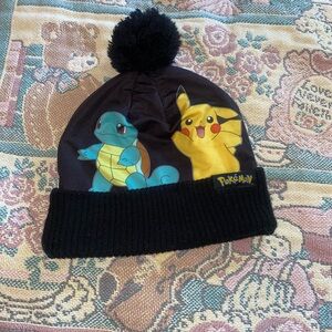 Pokémon beanie with ball on top >.<
